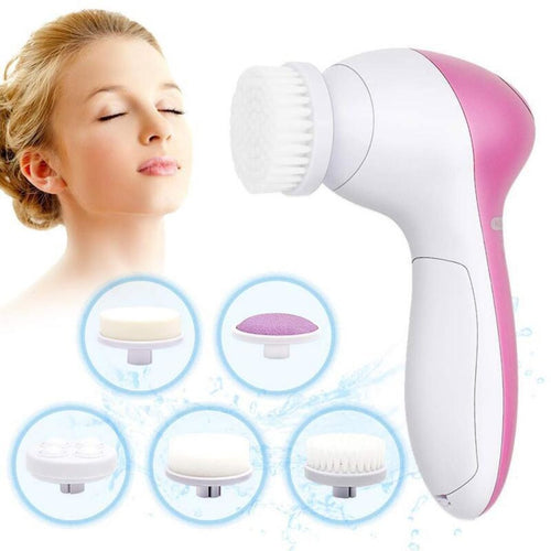 Woman using a rotating facial cleansing brush on her face